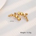 Boucles d'oreilles boules en acier inoxydable doré avec cinq sphères de design courbe - Grande Taille / Doré