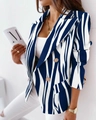Dettaglio del blazer a righe blu e bianche con bottoni dorati a doppio petto - S / Righe Blu