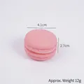 Rosa Macaron Squishy Spielzeug aus PU, 4,1cm simuliertes Dessert Modell für Stressabbau - Rosa