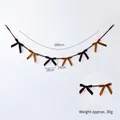 Velvet bow garland in brown and caramel shades, measuring 180cm for festive decoration - Dark Brown & Light Brown Mixed