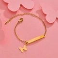 Polished gold rectangular plate bracelet with butterfly charm on pink background - Gold Butterfly