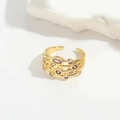 Meerlaagse gouden ring met paarse zirkoonstenen en een opengewerkt gelaagd design - Meerlaagse paarse zirkoon / Paars/Goud