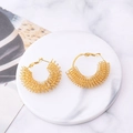 Exaggerated 18K gold-plated spiral twist hoop earrings with luxury marble background - Spiral Wrapped Hoop