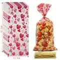 Detailed view of heart pattern candy bags with dimensions 27.5x12.5cm and gold ties - No.6 Single Style Valentine