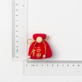 Handmade red crochet lucky bag keychain with gold Fu character and pearl tassel details - Red Blessing Character Luck Bag