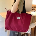 Large red nylon folding tote bag with black handles and size dimensions 54x42x11cm - XL Wine Red