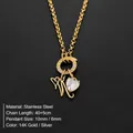 Gold stainless steel initial N necklace featuring a heart-shaped crystal pendant - Letter N(XNL0085)