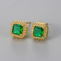 Macro shot of square emerald green stone earrings with white zircon halo in gold plating - Gold Green