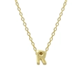 Macro shot of 925 sterling silver capital letter R pendant with golden finish chain - Letter R / Gold