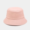 Close-up of a pink cotton bucket hat showing detailed fabric texture and fine stitching - One Size / Dusty Pink