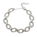 Macro detail of silver twisted chain bracelet featuring a Love charm and toggle clasp - Oval Twisted Style / Silver Bracelet
