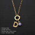 Goudkleurige roestvrijstalen ketting met een 'D' letterhanger en een paarse kristallen hanger - Letter D Stijl (Goud) / Goud