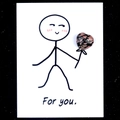 Handmade card with a heart-shaped pink rhodonite stone and stick figure illustration - Rhodonite