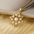 Elegant gold box chain necklace with star pendant featuring pearls and zircon accents - Octagram Pendant / Gold