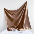 Detail view of glossy brown satin silk square scarf with soft drape and smooth texture - 90*90cm / Light Coffee