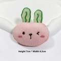 Close-up of pink fabric bunny accessory with 7cm x 6.2cm dimensions and fine embroidery - Pink Rabbit