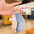 Porte-clés hérisson en peluche bleu clair avec anneau métallique doré et mousqueton - Bleu