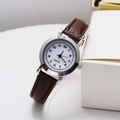 Close-up of retro quartz watch featuring white dial with Arabic numerals and brown leather strap - Silver Case Arabic Numerals White Dial Coffee Strap