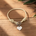 Beige woven couple bracelet featuring a silver heart charm and vintage OT toggle clasp - Beige Braided Rope - OT Buckle - Heart Pendant