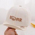 Detail of white baby sun hat showing brown bear embroidery and soft cotton fabric - 48cm(6-24 Months) / Bear Style - Cream White