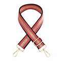 Macro detail of adjustable striped bag strap with gold metal buckle and pink webbing - Watermelon red