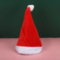 Classic red and white plush Santa hat for adults and kids on a festive background - Composite Long Plush Christmas Hat