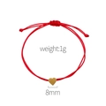 Red braided rope bracelet featuring a golden heart pendant with 8mm size and 1g weight - Red