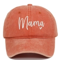Close-up of Mama and heart embroidery on the front of a washed vintage baseball cap - Orange