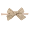 Beige ribbed cotton baby headband featuring a large bow on an elastic nylon band - Khaki (14)