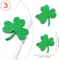 Green shamrock napkin ring with dimensions five cm high by four point nine cm wide - Green Glitter Clover