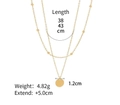 Double-layer gold stainless steel necklace with round pendant and bead chain details - Layered Gold Bean Disc (fa)