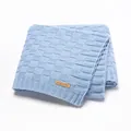 Light blue knitted baby blanket with square weave pattern and brown leather label - 100*80 / Light Blue