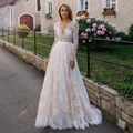 Elegant white lace long sleeve wedding dress with deep V-neck and open back for brides - US2 / White