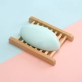 Handmade light blue oval soap bar on a minimalist natural wooden soap holder tray - 110g Thai-style Lavender Soap