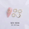 Macro shot of gold hollow flower nail charm MZH-8036 with 10.5x11mm dimensions on nail - Gold Hollow Flower Style (8036)