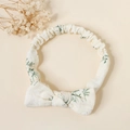 Close-up of baby cotton headband with green leaf print and cute bow detail - Small Orchid