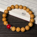 Bamboo style sandalwood bead bracelet with yellow wood beads and one red accent bead - Sandalwood 10mm with Synthetic Cinnabar