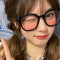 Chic oversized black frame sunglasses with pink gradient lenses worn by a model - Trending Blush Style Sunglasses