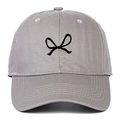 Close-up of embroidered black bow design on light gray cotton baseball cap crown - Gray