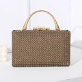 Luxury gold evening clutch bag with amber rhinestones and bamboo style metal handle - Gold