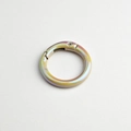 Close-up of circular alloy spring ring with rainbow iridescent electroplated finish - Milk Tea Color (High Quality Plating)