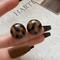 Detailed view of round leopard print resin earrings with a smooth polished finish - 32# 925 Sterling Silver Earring Post - Leopard Print - Large Round 1.8cm