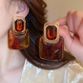 Vintage amber resin square drop earrings with gold metal frame on a female model - Vintage Amber Large Square Style (No. 8 Silver Earring Post - Gold & Coffee)