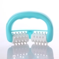 Sky blue manual handheld roller massager with white textured wheels on white background - Point Neck Massager Blue