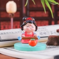 Detailed close-up of a Q-style ancient lady figurine playing the guqin on a blue base - 1056-16A Playing Zither Stand
