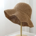 Women's woven straw sun hat in deep khaki finish on a golden display stand - 8cm Brim (Shaping Wire) / Khaki