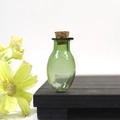 Mini oval glass wishing bottle in light green with cork stopper for DIY crafts and decor - Grass Green Oval Bottle With Cork
