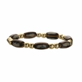 Détail du bracelet en perles de cuivre dorées et perles de céramique ambrées texturées - Perles en Cuivre + Bleu Outremer Ovale