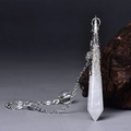 Detailed close-up of white quartz hexagonal crystal pendulum with vintage silver metal cap - Silver White Crystal