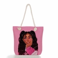 Pink canvas tote bag featuring ethnic cartoon illustration and beige hemp rope handles - Pink Background Cartoon Woman